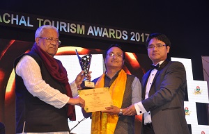 The Governor of Arunachal Pradesh Shri PB Acharya presenting awards on the   occasion of State Tourism Award function at IG Park Itanagar on 31st January�2017.